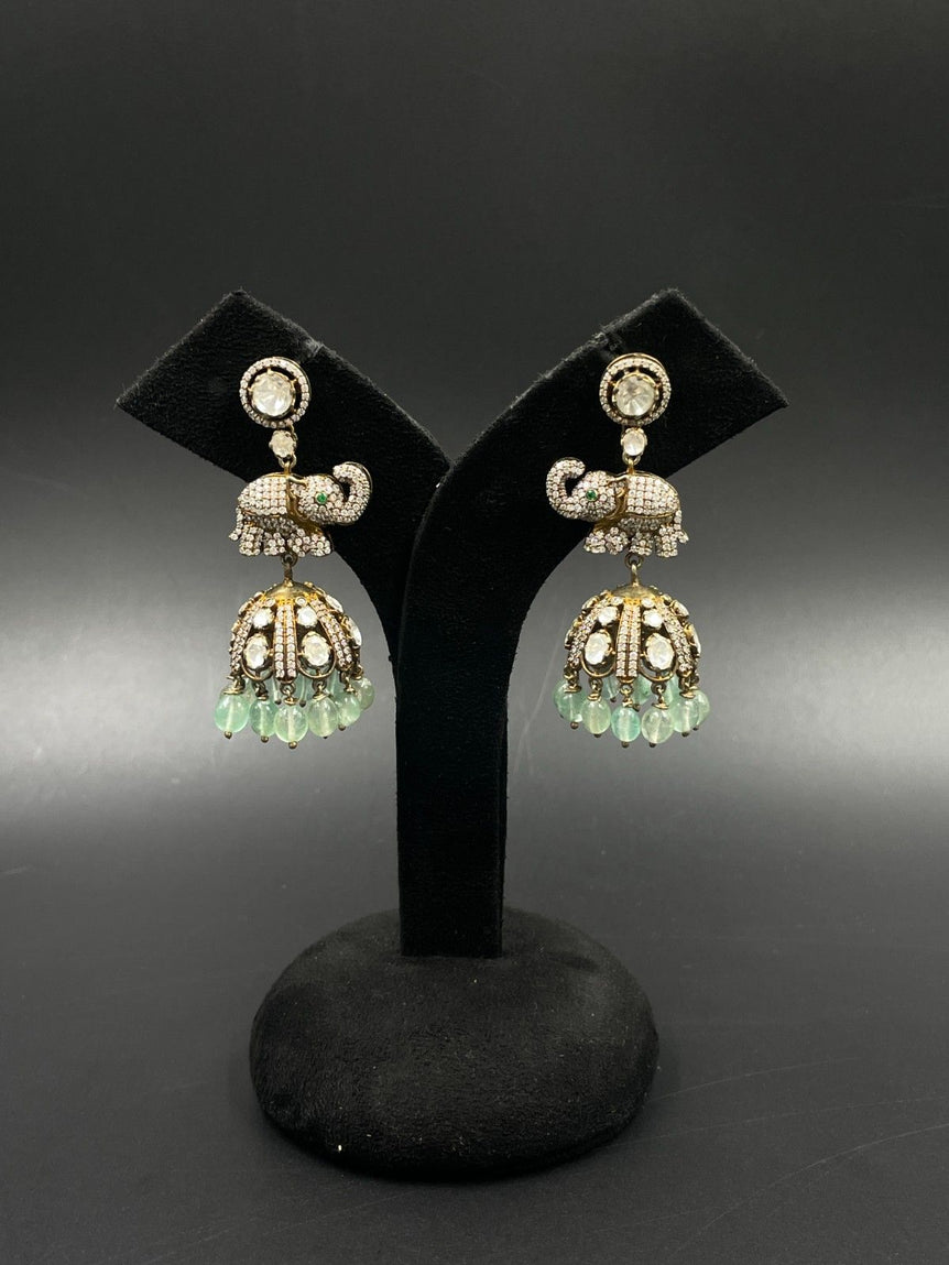 LONG ELEPHANT DESIGN PURE SILVER JHUMKAS - Olivearajewels