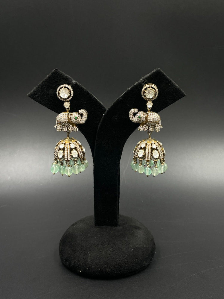 LONG ELEPHANT DESIGN PURE SILVER JHUMKAS - Olivearajewels